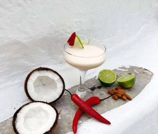 White cocktail coconuts lime red chili peppers